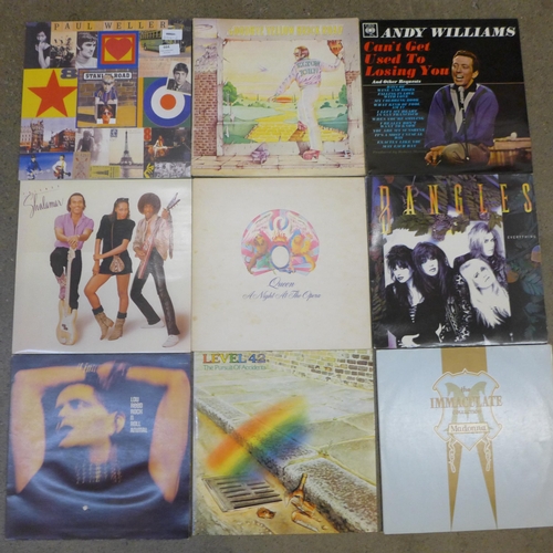 664 - Sixteen LPs - Paul Weller, Elton John, Madonna, Beach Boys, etc.