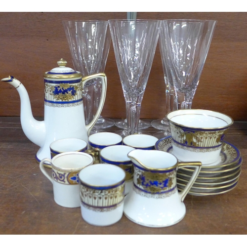 676 - A Noritake coffee set with blue and gilt decoration, six saucers, five coffee cans, a sugar bowl, mi... 