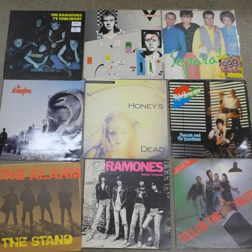 696 - Fifteen punk and new wave LP records and 7