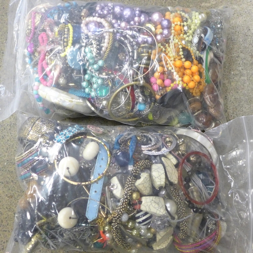 718 - Two bags of costume jewellery