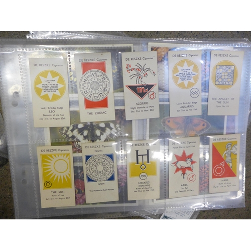 724 - A collection of cigarette and tea cards