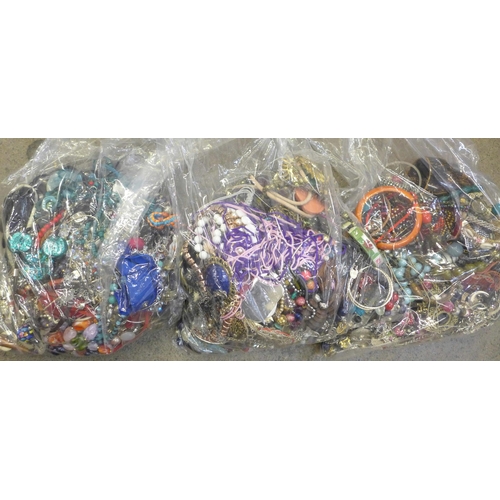 728 - Three large bags of costume jewellery