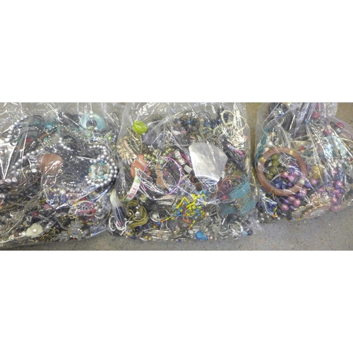 728 - Three large bags of costume jewellery