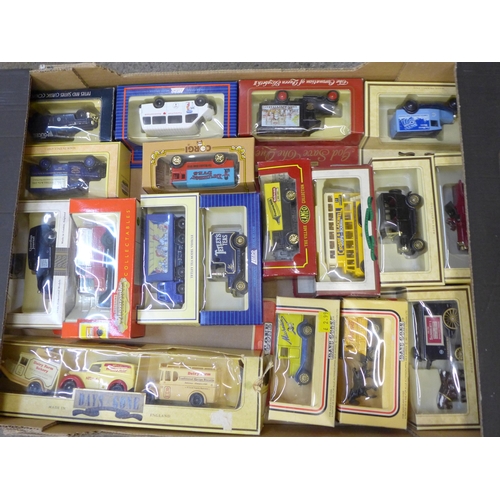 730 - A collection of eighteen model vehicles