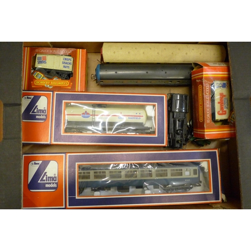 736 - A collection of model rail, including 00 gauge Lima and Hornby, a HO Inter City carriage, two 00 gau... 