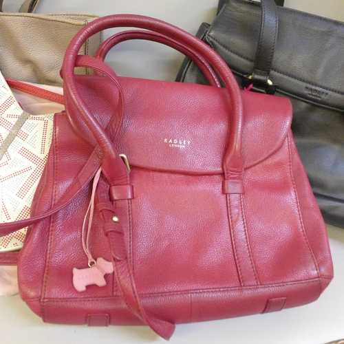 754 - Five Radley hand bags, (two as new)