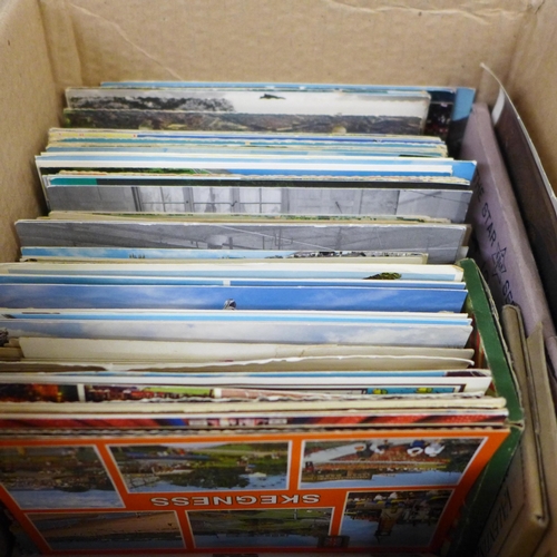 764 - A box of assorted postcards and three albums of railway collectors cards