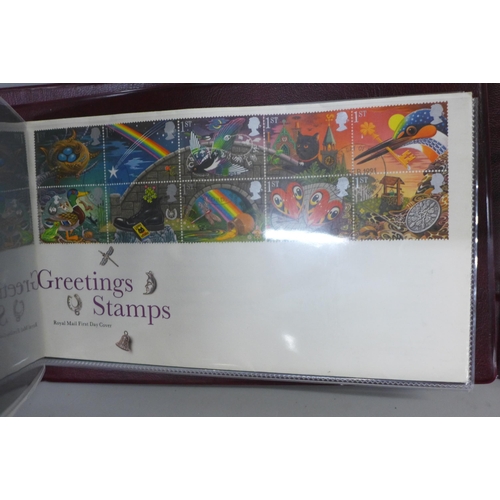 769 - Stamps; two albums of first days covers, a replica penny black stamp set and a Royal Mail identity c... 