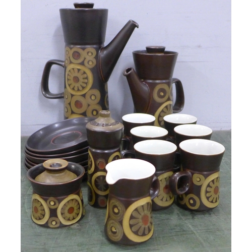 775 - A Denby Arabesque six setting coffee set with two pots, sugar bowls and shaker