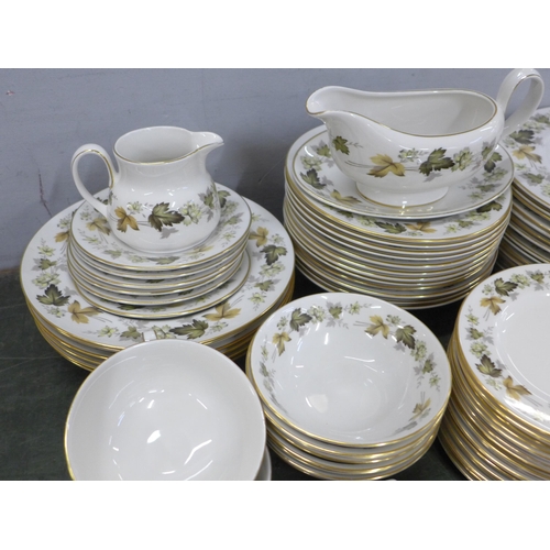 776 - A Royal Doulton Larchmont dinner service, with a coffee set, soup bowls and sugar bowl, etc., over 1... 