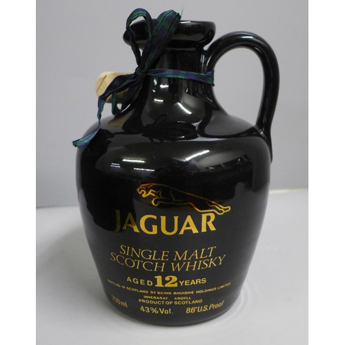 781 - A Jaguar (motor company) presentation single malt Scotch whisky decanter, boxed and sealed