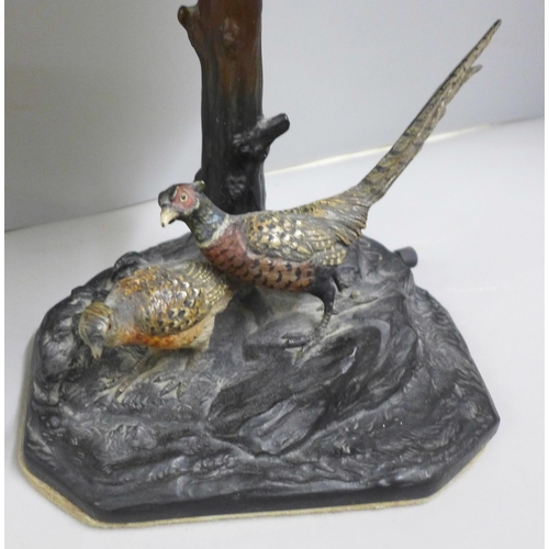 783 - An Austrian cold painted bronze table lamp with two game birds, signed J. Gadek, with a Muller Frere... 