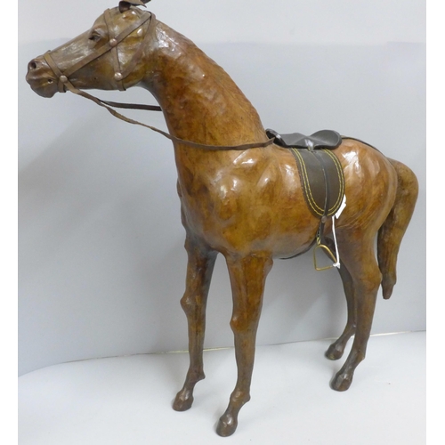 785 - A brown leather model of a horse, height 49cm