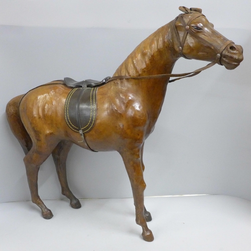 785 - A brown leather model of a horse, height 49cm