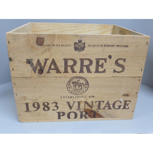 789 - Four bottles of 1983 Warre's vintage port and original box for twelve bottles