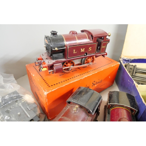 803 - A collection of Hornby O gauge model rail including a clockwork LMS No.1 tank locomotive in original... 