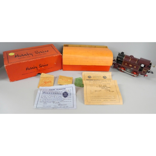 803 - A collection of Hornby O gauge model rail including a clockwork LMS No.1 tank locomotive in original... 