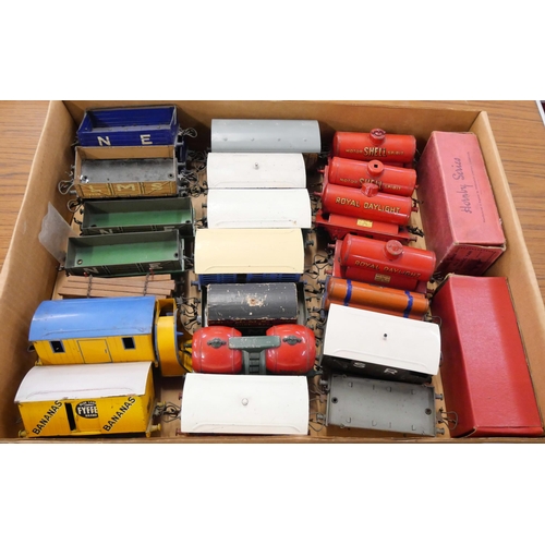 804 - A collection of 25 Hornby O gauge tinplate wagons including a snow-plough, Fyffes Banana van, Southe... 