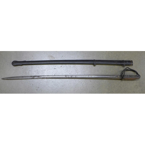 822 - A British 1821 pattern Volunteer Artillery sword with steel scabbard, single edged blade with double... 