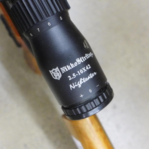 823 - An Air Arms S410 TRD 0.22 calibre air rifle with a Nikko Stirling 2.5-10x42 Nighteater scope