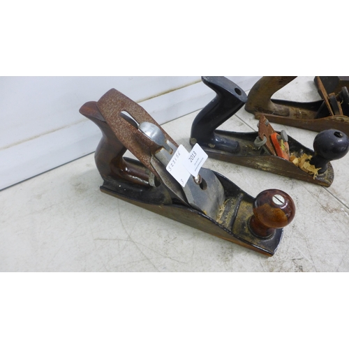 2013 - Three vintage wood planes including a Stanley SB3, a No.3 plane and one other, a molding plane, a Nu... 