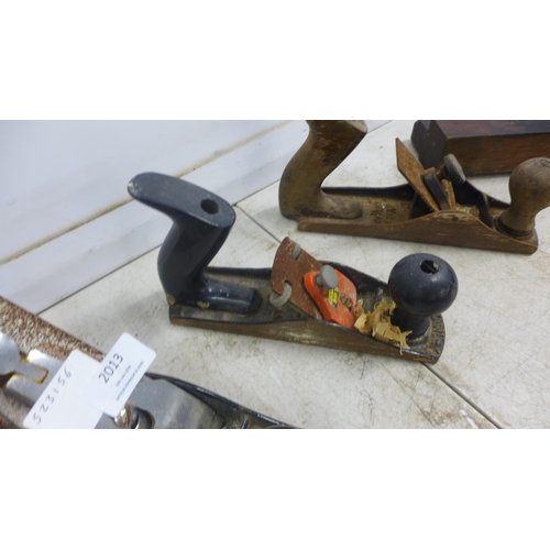 2013 - Three vintage wood planes including a Stanley SB3, a No.3 plane and one other, a molding plane, a Nu... 