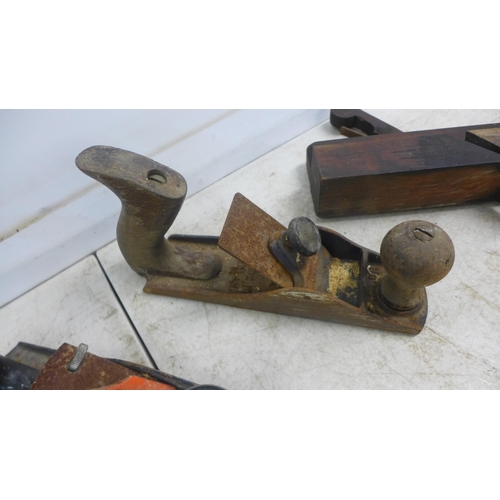 2013 - Three vintage wood planes including a Stanley SB3, a No.3 plane and one other, a molding plane, a Nu... 