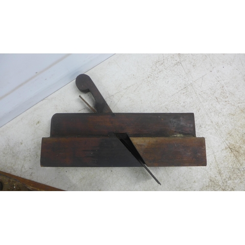 2013 - Three vintage wood planes including a Stanley SB3, a No.3 plane and one other, a molding plane, a Nu... 