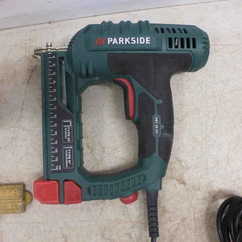 2030 - A Parkside PET25 C3 240v nailgun/stapler and a Power Plus POW750 spray gun and measuring sticks