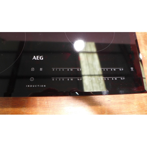 3078 - AEG 4 Zone Induction Hob (H44xW590xD520) (Model no: IKB64401FB) (550-113) * This lot is subject to v... 