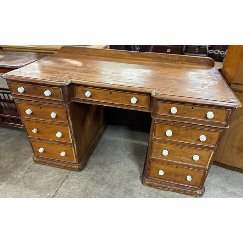 227 - A Victorian pine breakfront pedestal desk