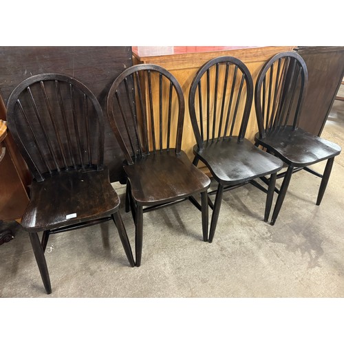 233 - A set of four elm and beech kitchen chairs