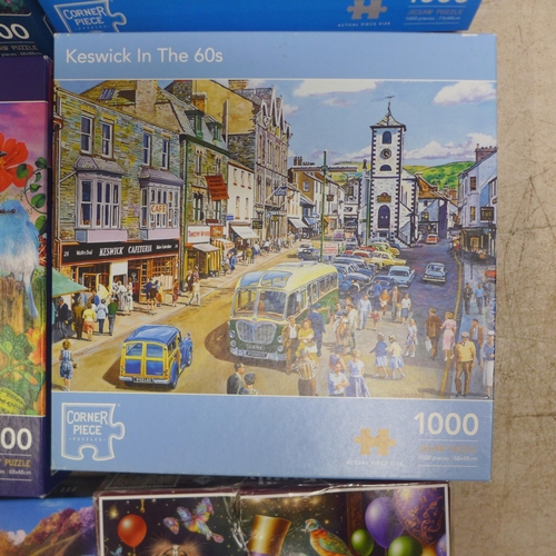 2063 - A box of ten assorted jigsaw puzzles