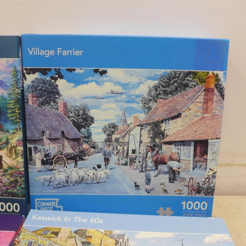 2063 - A box of ten assorted jigsaw puzzles