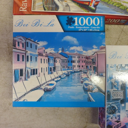 2063 - A box of ten assorted jigsaw puzzles