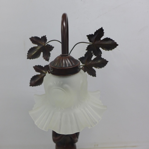 2074 - A light bronze effect statue of a lady table lamp