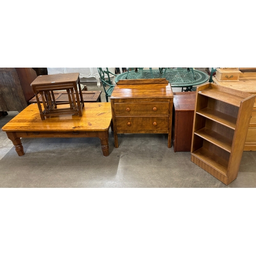 238 - An assortment of furniture including an oak coffee table, a lockable cabinet, an oak open bookcase, ... 