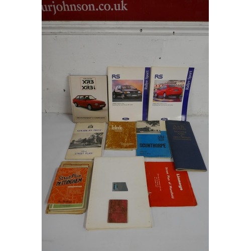 2096 - A collection of assorted auto ephemera including enthusiast companions, street plan maps and other i... 