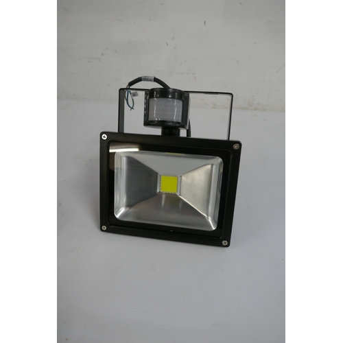 2113 - A Lloytron 20w wall mountable LED flood light with PIR sensor