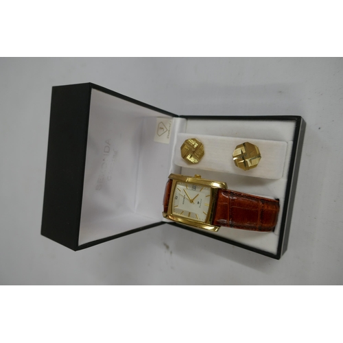 2129 - A gentleman's Sekonda diamond wristwatch and cuff link set, boxed