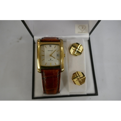 2129 - A gentleman's Sekonda diamond wristwatch and cuff link set, boxed