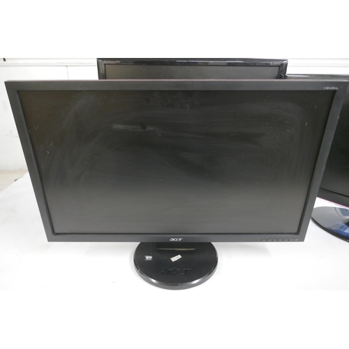 2170 - An Acer LCD monitor, a Samsung monitor and an LG monitor