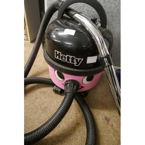 2173 - A pink Hetty numatic vacuum cleaner and a Bissell quickwash floor cleaner