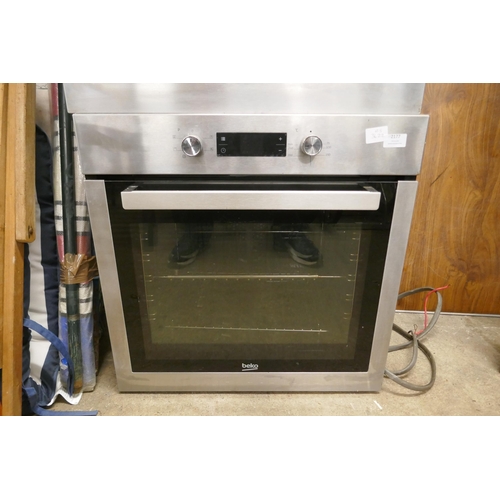 2177 - A Beko stainless steel glass door integrated single oven