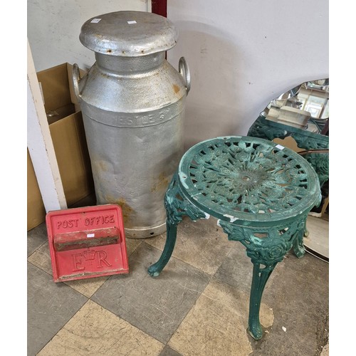 401 - An aluminium garden stool, a Nestlé galvanised milk churn and a cast iron Post Office face plate