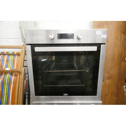 2178 - A Beko stainless steel glass door integrated single oven