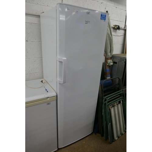 2180 - A Beko model TFFC671W white seven drawer free standing freezer