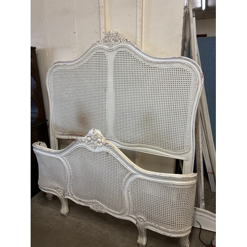 269 - A French painted pine and bergère double bed