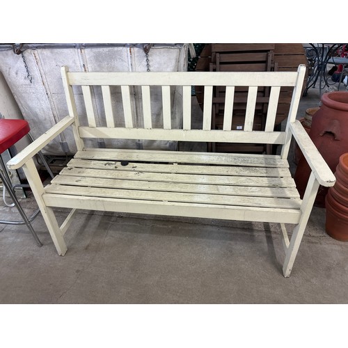 272 - A painted pine garden bench