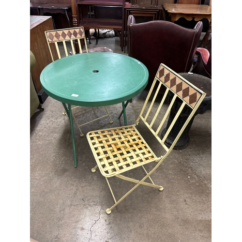 275 - An aluminium garden table and two chairs